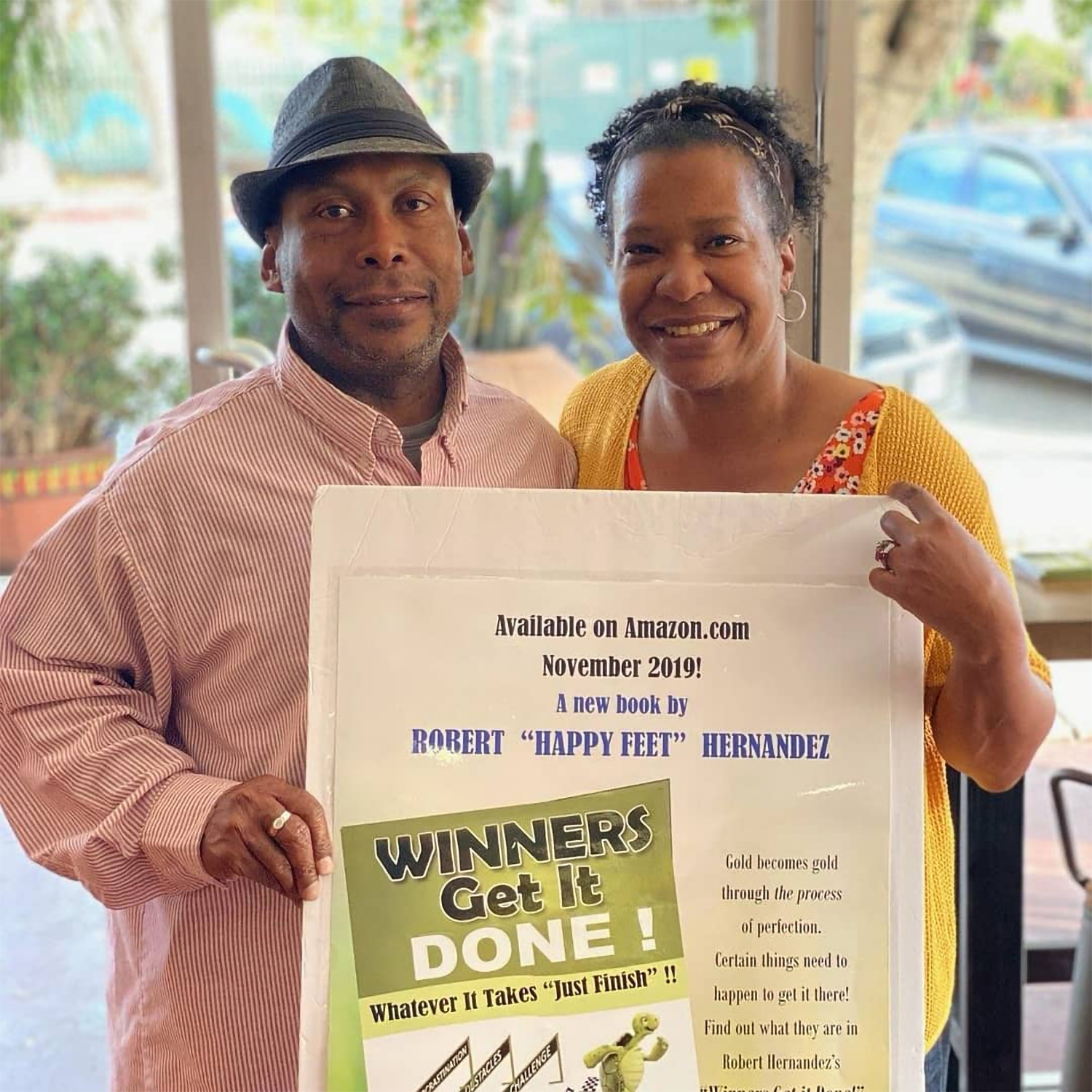 Robert Happyfeet Hernandez sharing Winners Get It Done at a community event